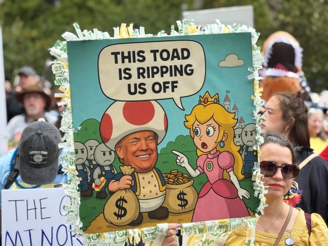 Anti-Trump sign depicting him as Mario Bros. toadstool.