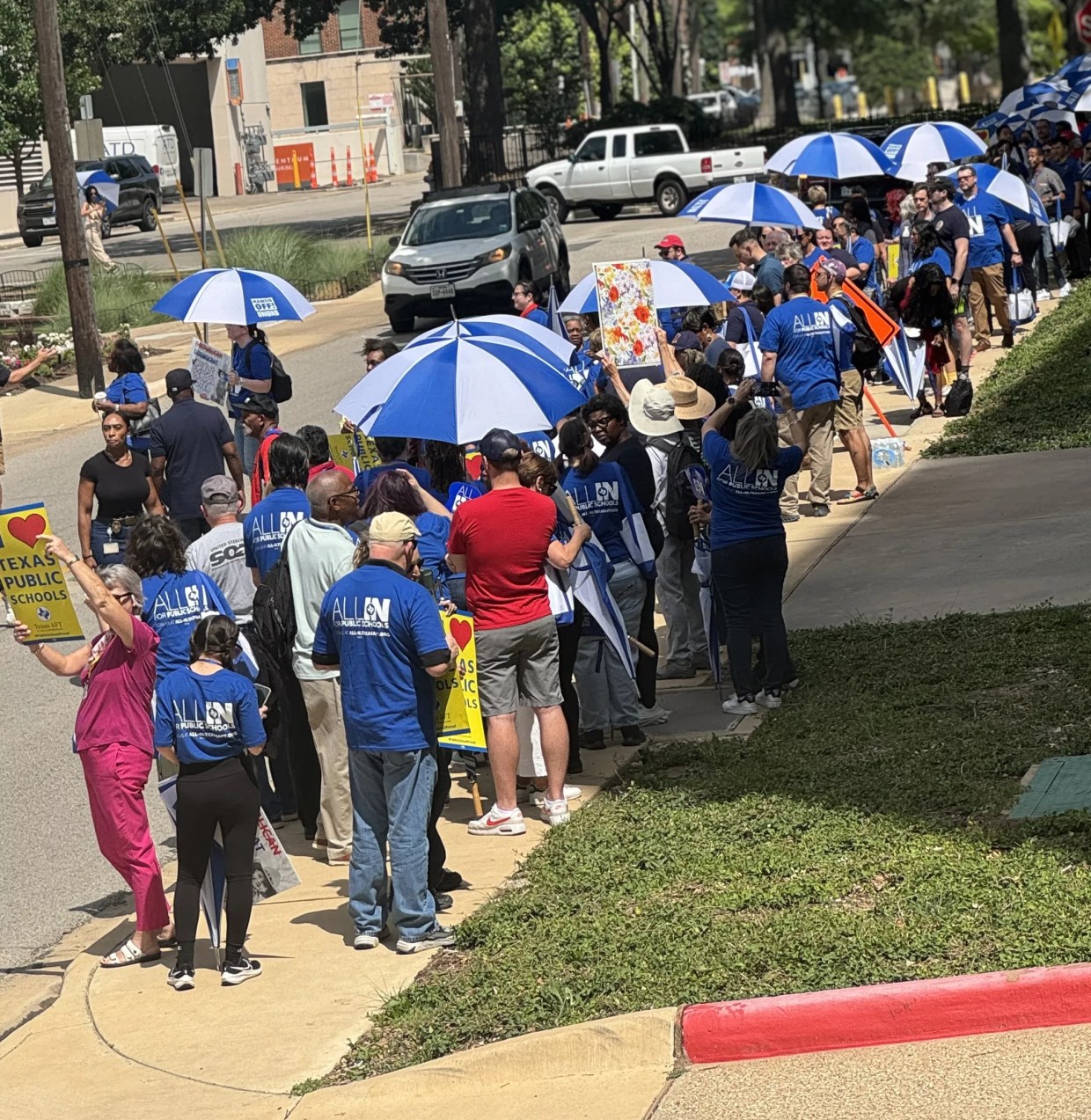 Educators Protest Layoffs And School Vouchers at Ted Cruz’s Dallas Office